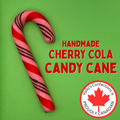 Handmade cherry cola candy cane with Volio's Confections branding on a green background