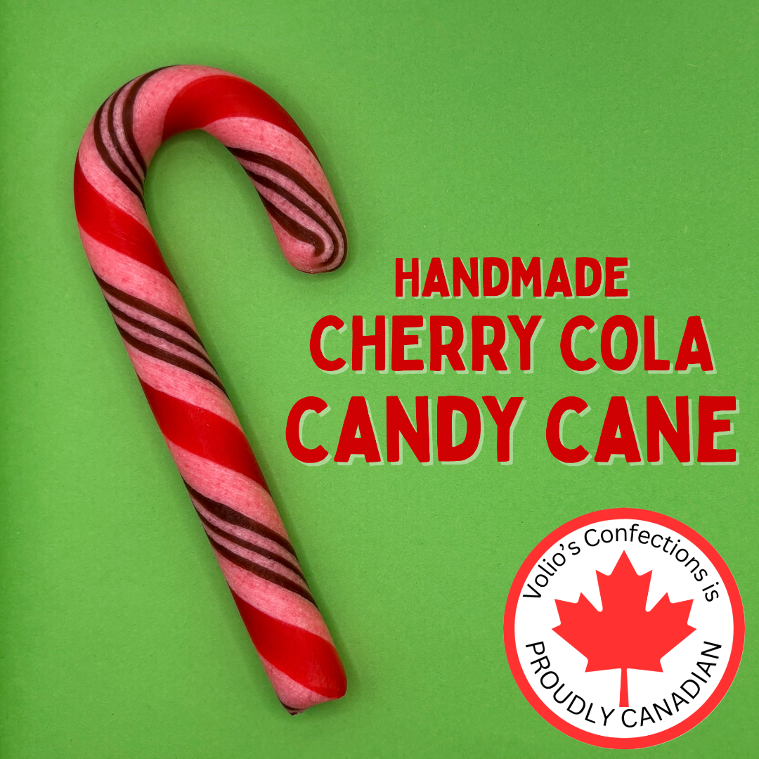 Handmade cherry cola candy cane with Volio's Confections branding on a green background