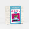 Hawthorn Handmade needle felting kit packaging with a Christmas car and tree design on a white background.
