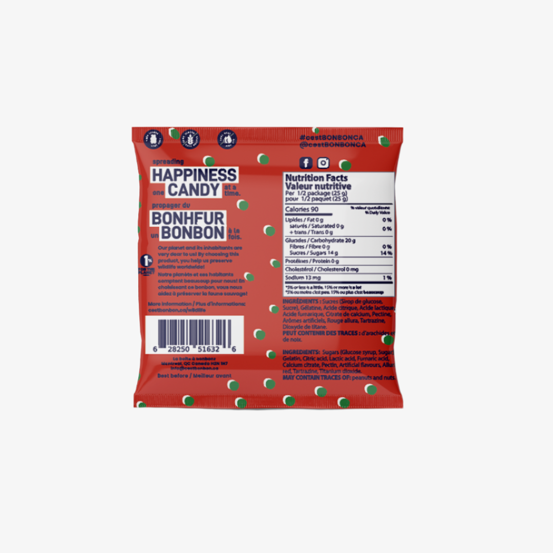  red, resealable pouch filled with Christmas-themed gummies. The pouch has a transparent window that shows the gummies inside. The label on the pouch is in French and English and reads "BONBON BONBON," "FRAIS FRESH," "TENDRE SOFT," "SANS GLUTEN GLUTEN FREE," "150 G," "MÉLANGE DE NOËL," and "CHRISTMAS SWIRLS." There are also icons on the label indicating that the product is gluten-free, vegan, and made in Canada. 