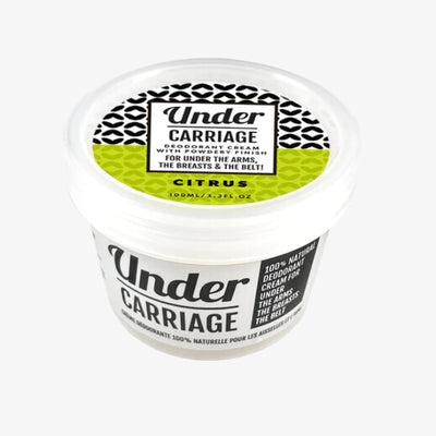 Under Carriage deodorant cream container on a white background