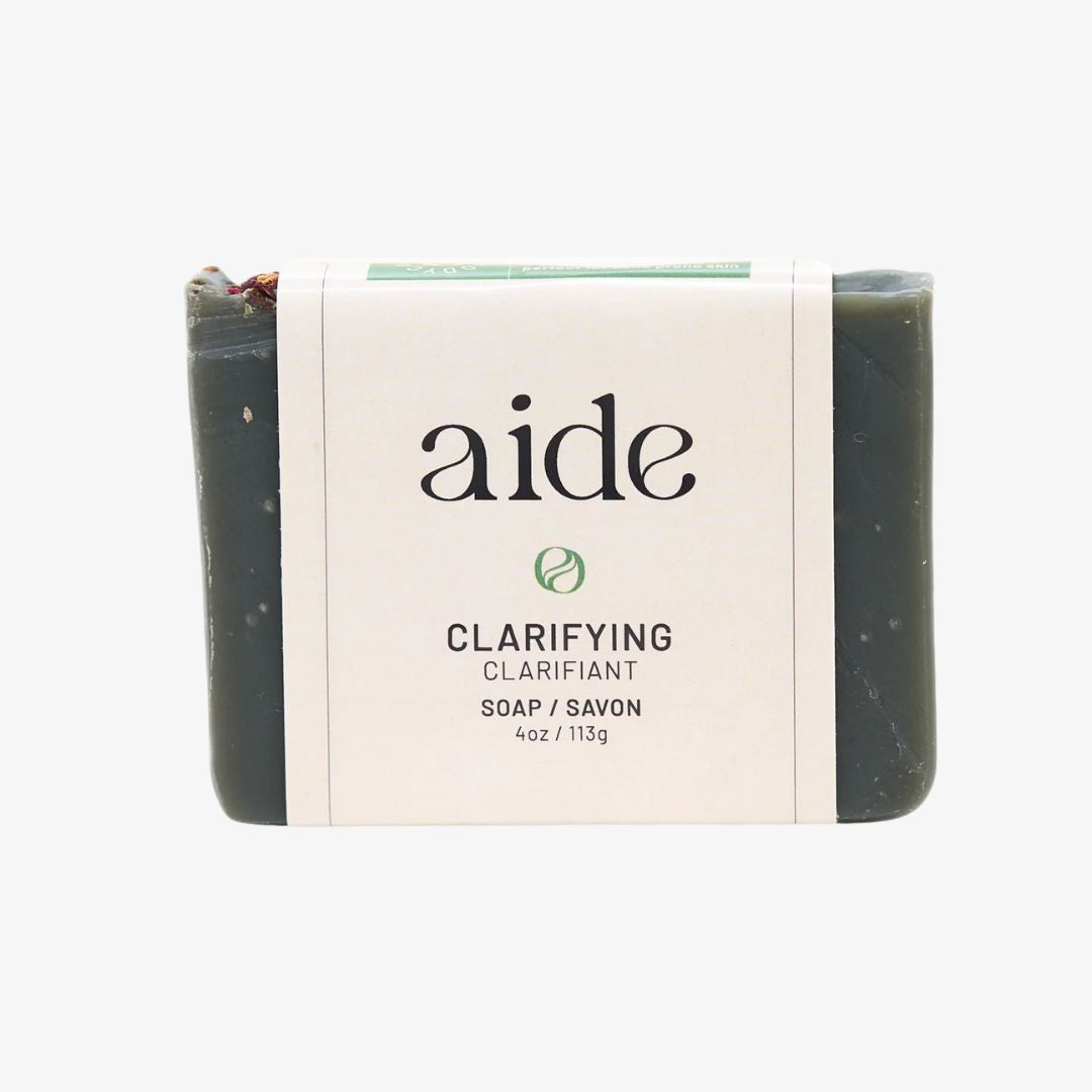 Bar of soap with 'aide' branding on a white background