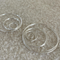 A set of classic hoop earrings made of 925 sterling silver, featuring various sizes of thin, polished silver hoops, displayed on a brown and textured surface. These simple and elegant earrings are available in Ottawa, Ontario, Canada.