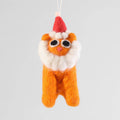 A felt ornament of an orange cat wearing a Santa hat. The cat has a white beard and large black eyes.