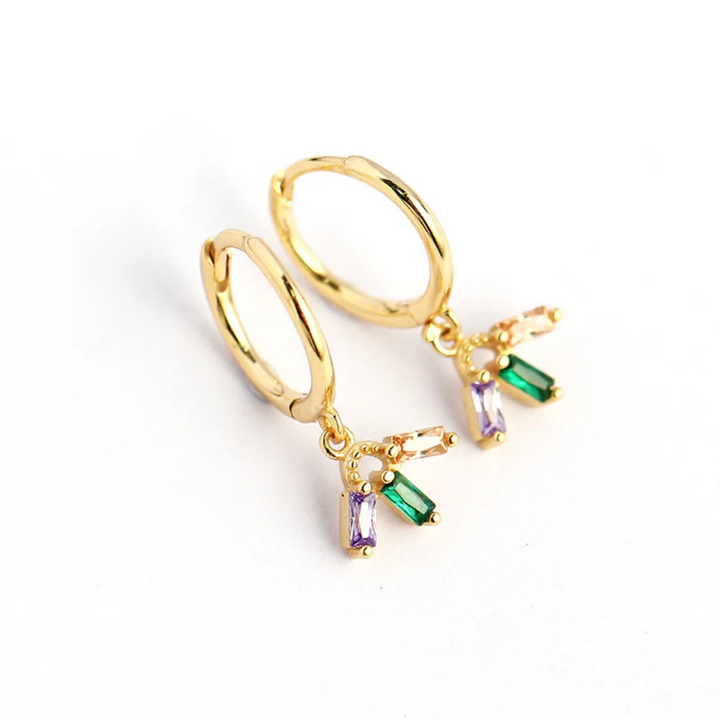 colourful crystal mini hoop earrings in gold, featuring small gold hoops with dangling clusters of purple, green, and peach rectangular crystals. These dainty and vibrant earrings are available in Ottawa, Ontario, Canada.