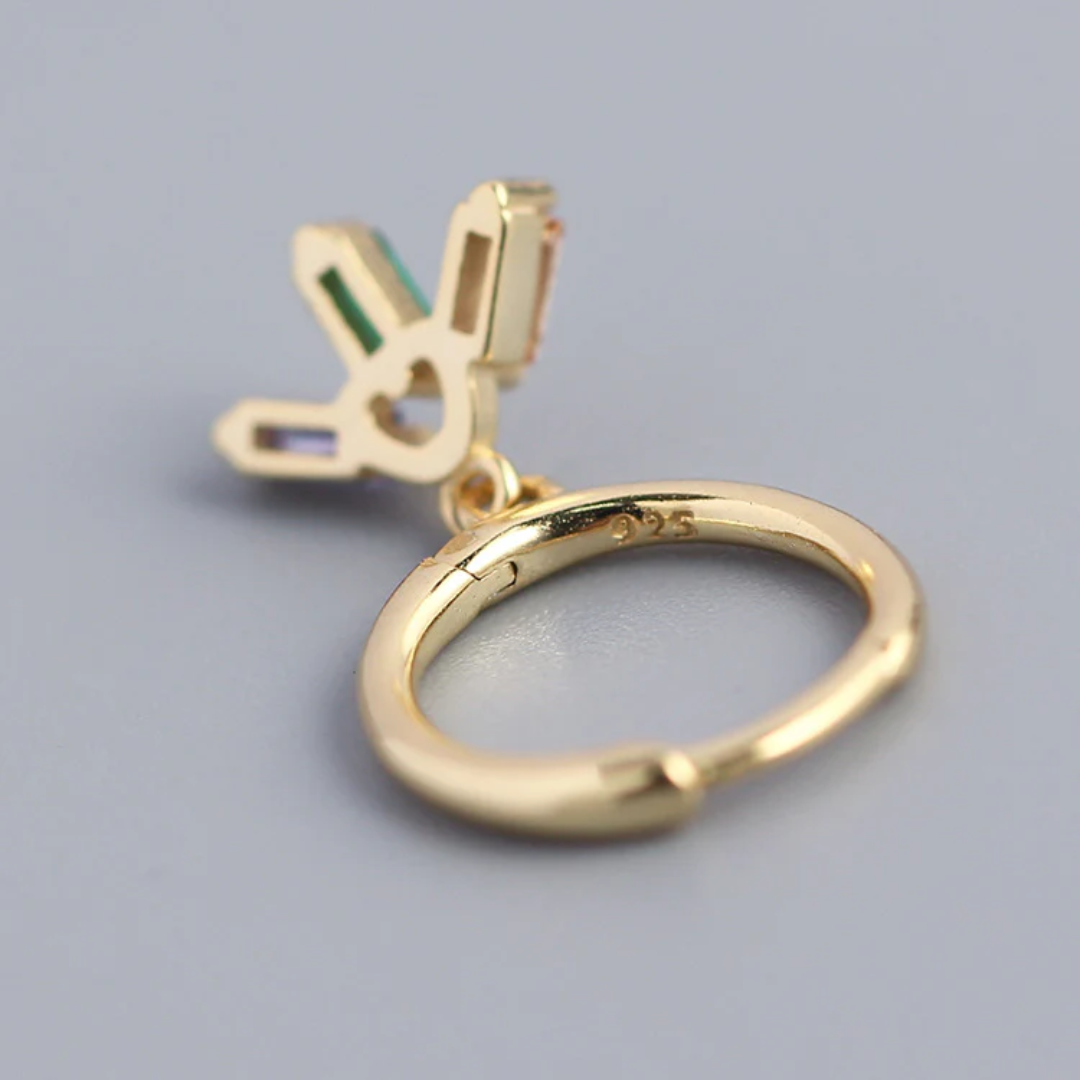 colourful crystal mini hoop earrings in gold, featuring small gold hoops with dangling clusters of purple, green, and peach rectangular crystals. These dainty and vibrant earrings are available in Ottawa, Ontario, Canada.