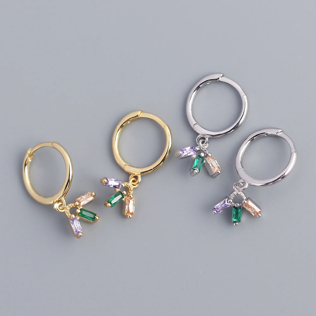 colourful crystal mini hoop earrings, featuring small gold hoops with dangling clusters of purple, green, and peach rectangular crystals. These dainty and vibrant earrings are available in Ottawa, Ontario, Canada.