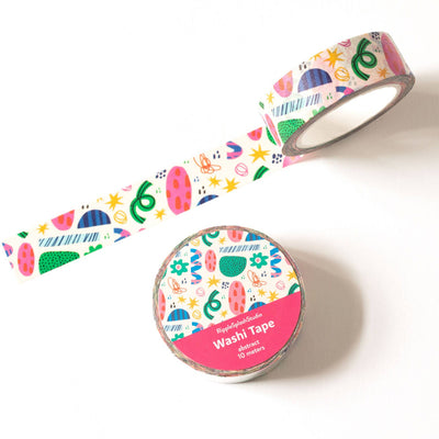 Colorful washi tape with a decorative container on a white background