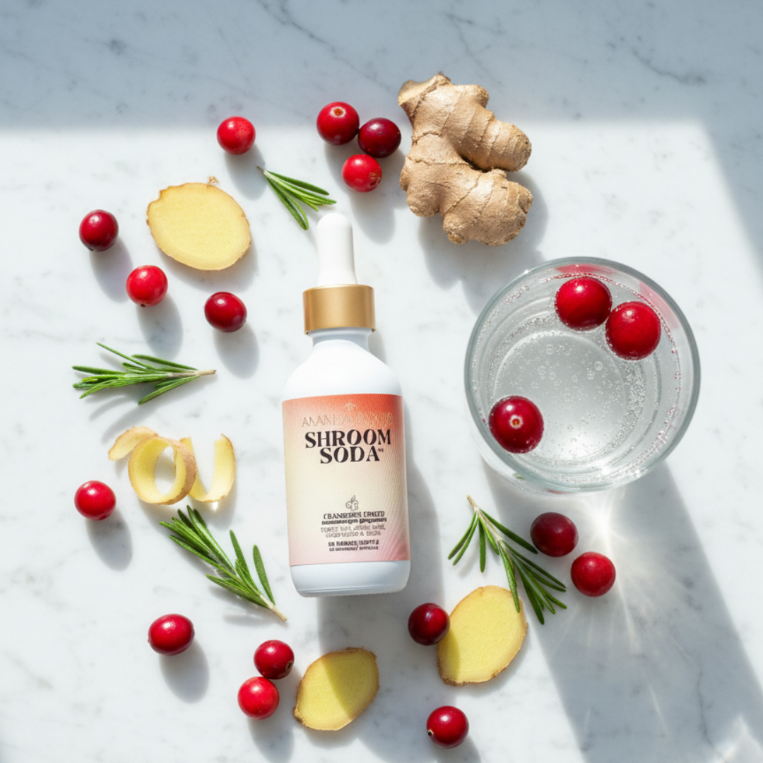 Shroom Soda bottle surrounded by cranberries, ginger, and rosemary on a marble surface.