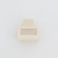 Rectangular soap bar with a small rectangular cutout on a light gray background