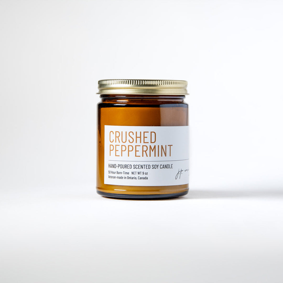 Jar of 'Crushed Peppermint' candle on a white background