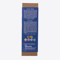 A cardboard box containing a Kiss Naturals Bath Bomb Kit. The box is green and white with the product name and a colorful illustration of bath bombs. It states that the kit is 100% natural, made in Canada, and suitable for ages 6 and up.
