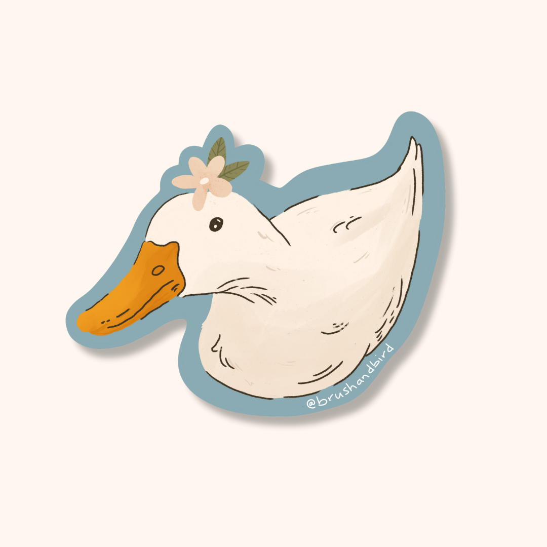 Sticker of a duck with a flower on its head against a white background