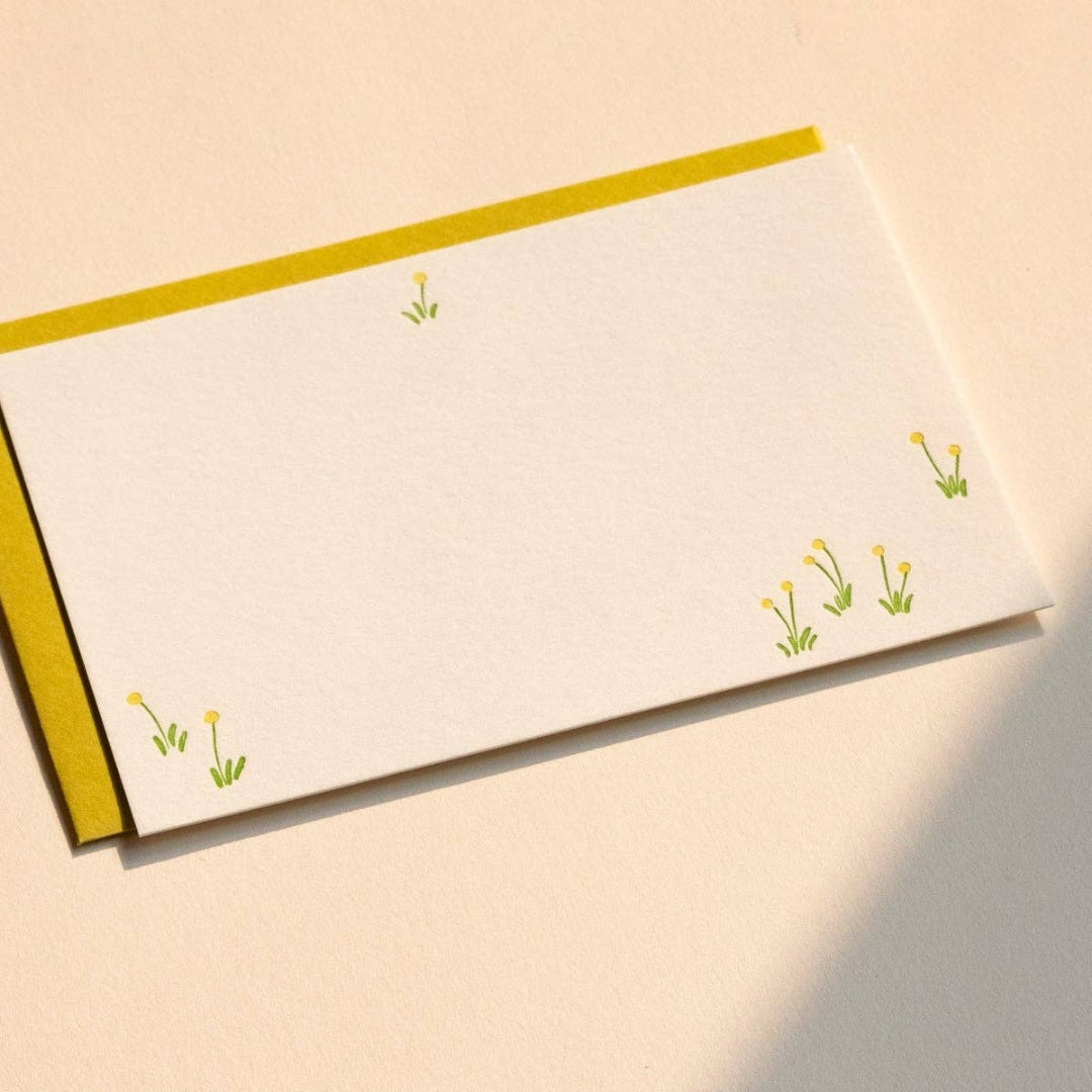 Notebook with floral design on a beige background