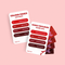 Happy Tears Intimate Connections card game, Ottawa. Red conversation cards in grey drawstring bag. 'Happy Tears' logo, bilingual text: 'For Intimate connections', 'Pour les connexions intimes'. Fun card game for couples.