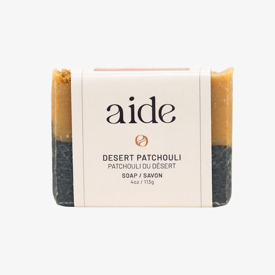 Bar of soap with 'aide' branding on a white background