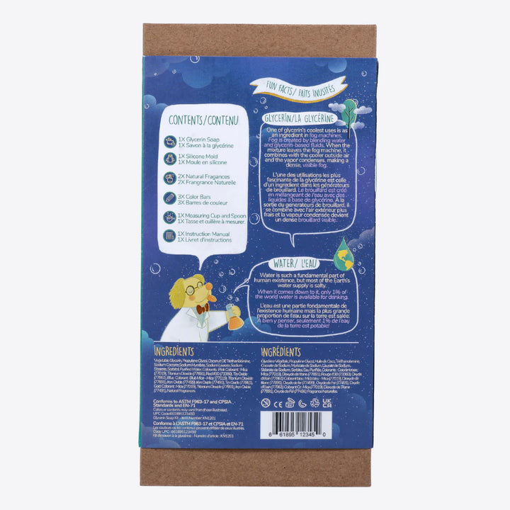 A cardboard box containing a Kiss Naturals Glycerin Soap Kit. The box is blue and white with the product name and a colorful illustration of penguins. It states that the kit is 100% natural, made in Canada, and suitable for ages 6 and up.
