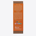 A cardboard box containing a Kiss Naturals Lip Balm Kit. The box is yellow and white with the product name and a colorful illustration of bees. It states that the kit is 100% natural, made in Canada, and suitable for ages 6 and up.