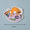 A cartoon illustration of a panicked orange cat surrounded by everyday objects like a vase, incense sticks, a cucumber, and a hairbrush. The text 