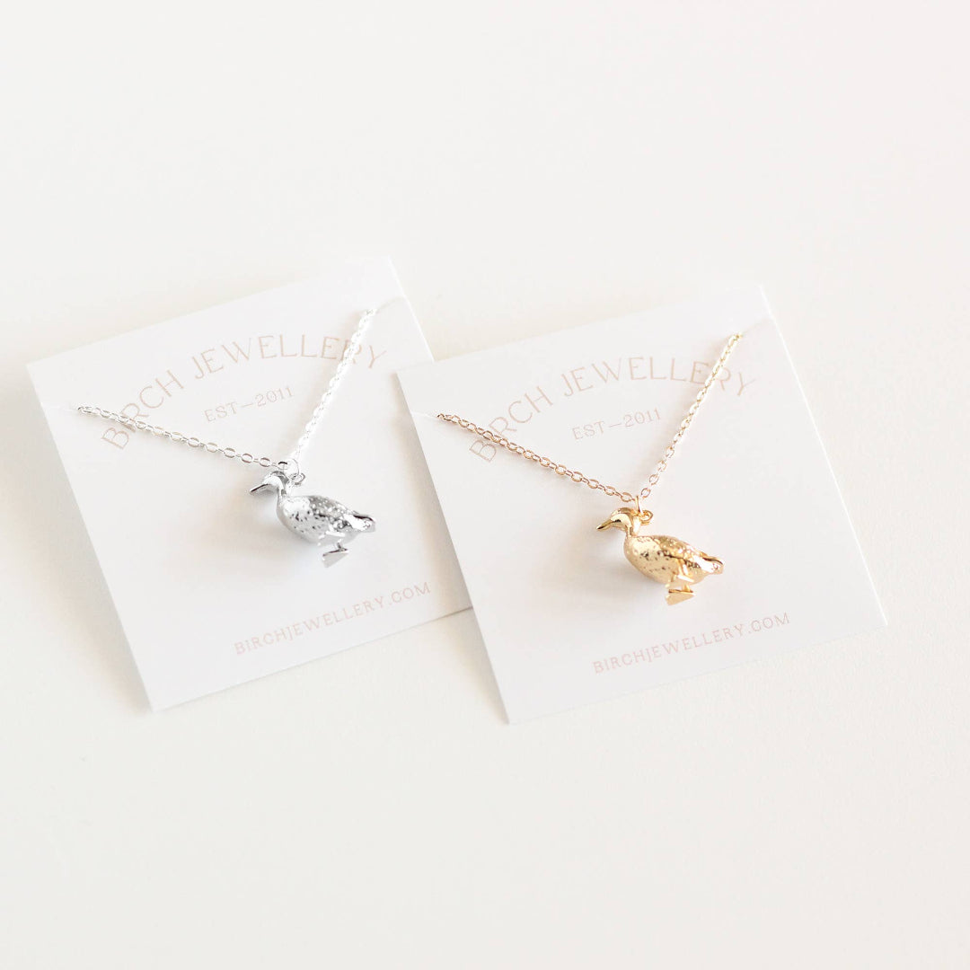 Two necklaces on branded card with 'Peach Jewellers' branding.