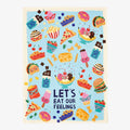 Colorful towel with food-themed design and 'Let's Eat Our Feelings' text on a blue background