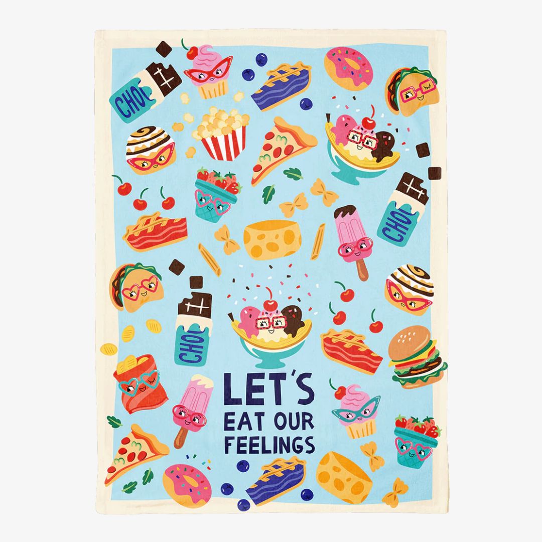 Colorful towel with food-themed design and 'Let's Eat Our Feelings' text on a blue background