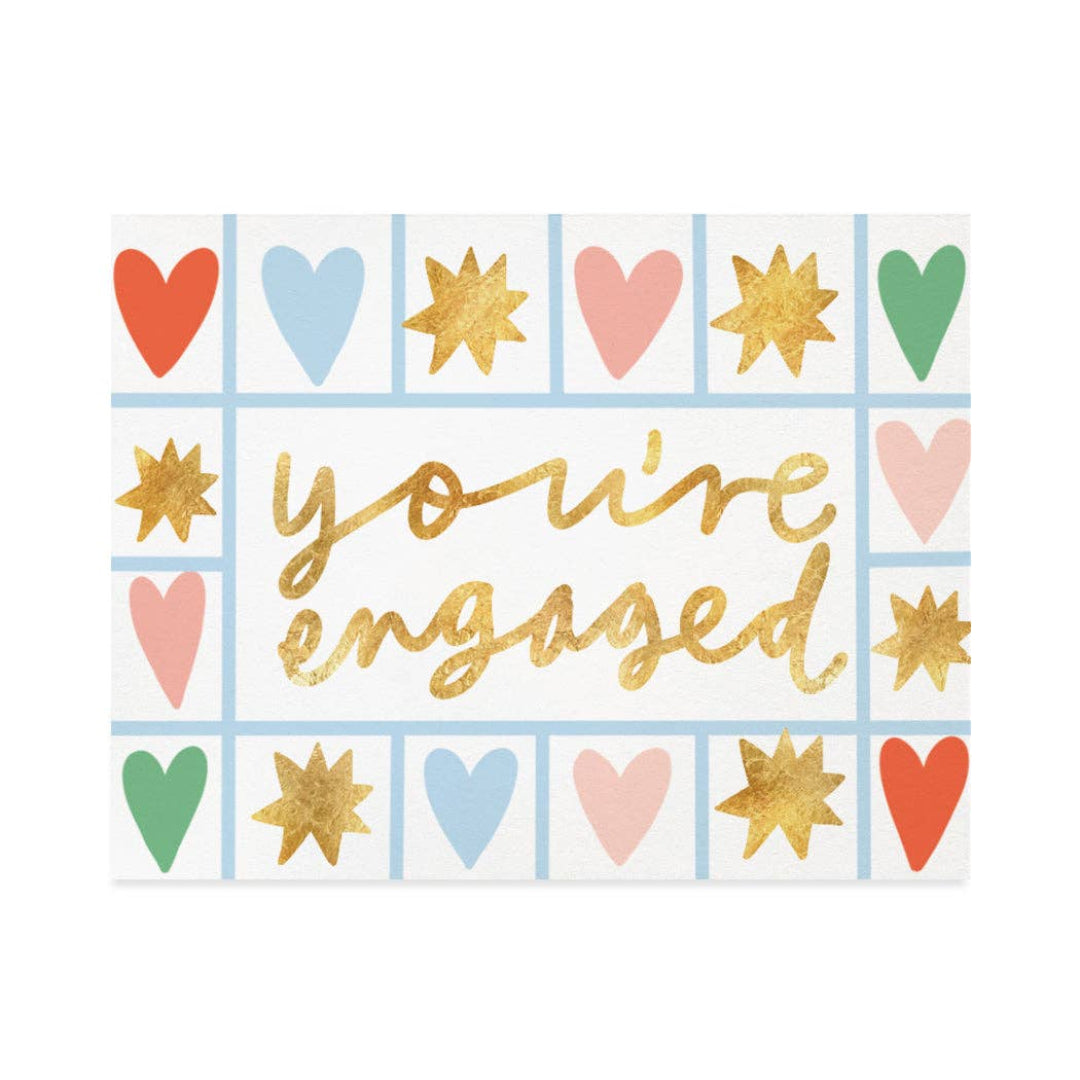 Card with 'you're engaged' text surrounded by colorful hearts and stars on a white background