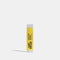 A yellow tube of Epic Blend Coconut Lemon Vegan Lip Balm. The label on the tube features the product name and indicates that it is vegan.