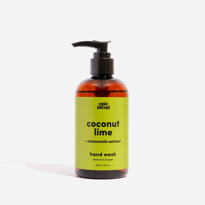 An amber plastic pump bottle of Epic Blend Coconut Lime Hand Wash with a lime green label. The label specifies 
