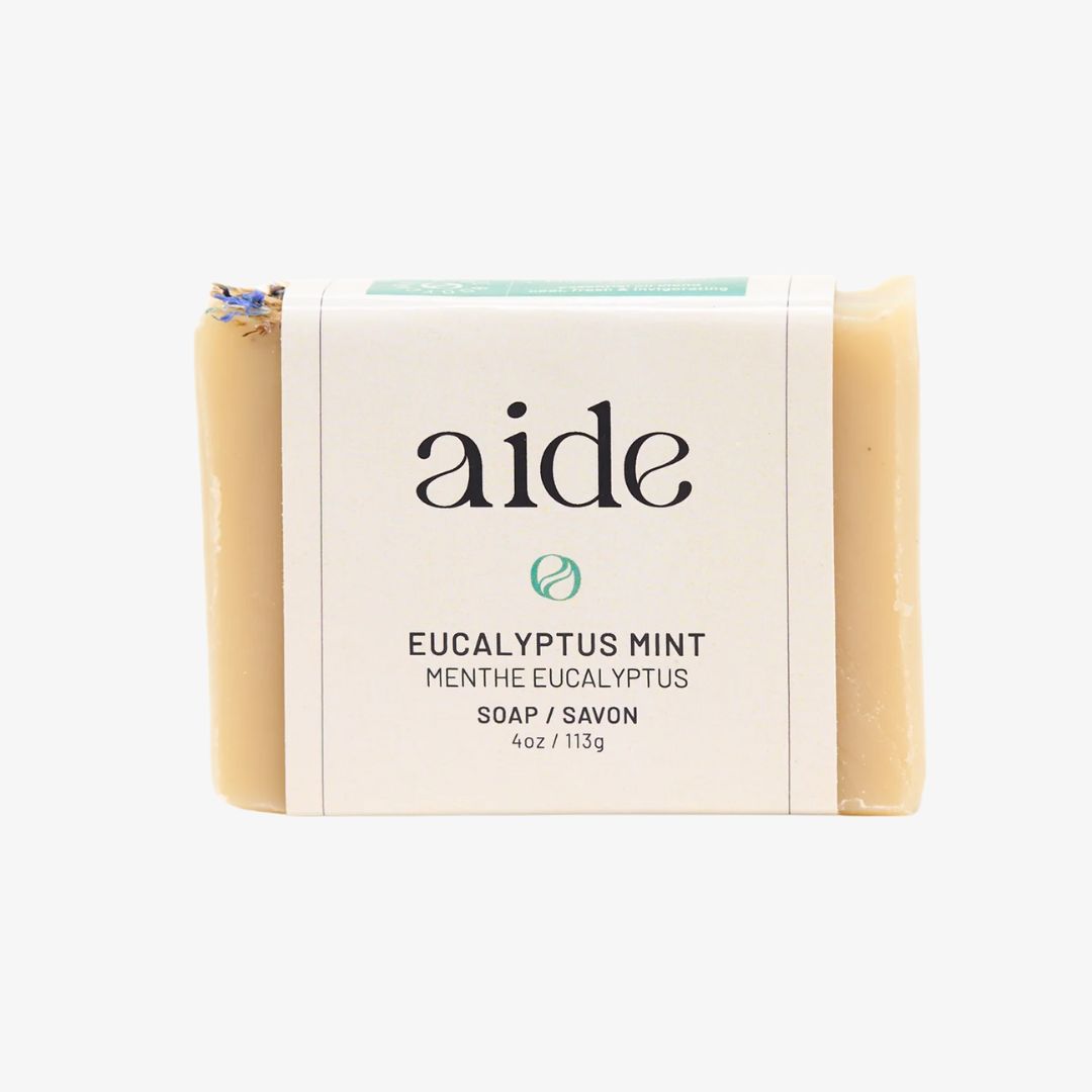 Bar of soap with 'aide' branding on a white background