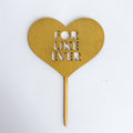 Heart-shaped gold topper with 'For Like Ever' text on a white background