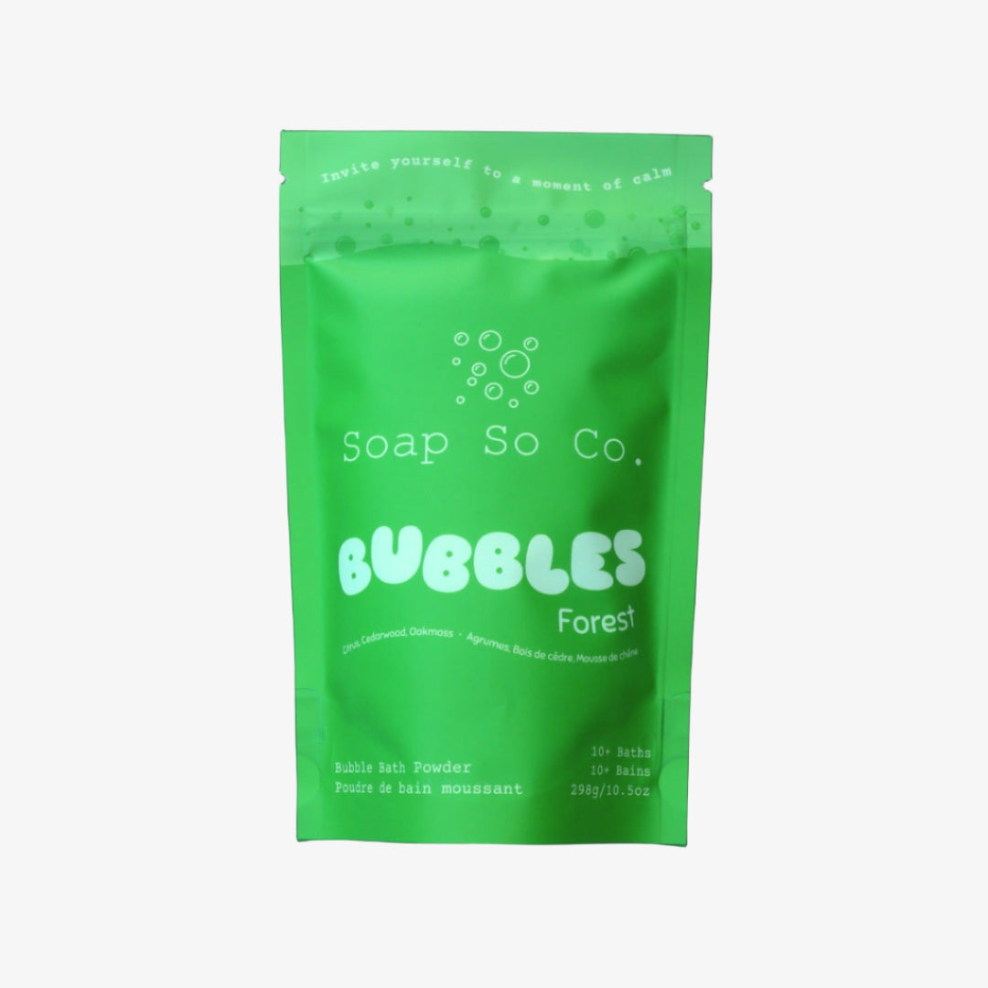 Green package of Soap So Co. Bubbles Forest on a black background