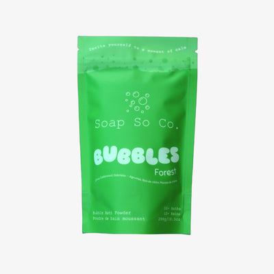 Green package of Soap So Co. Bubbles Forest on a black background