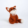 Stuffed fox toy on a white background