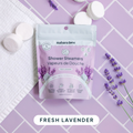 Naturebee shower steamers with lavender on a purple and white checkered background