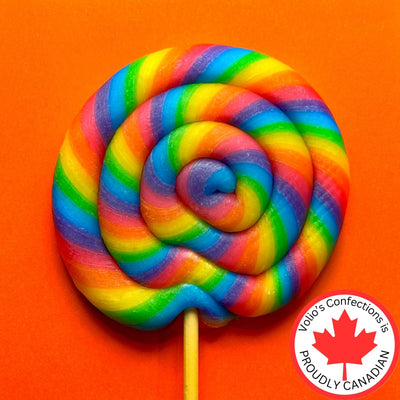 Colorful swirled lollipop on an orange background with Vollo's Confections logo.