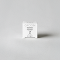 Kiioma Groom deodorant packaging on a light gray background