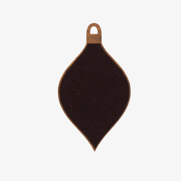 A wooden ornament shaped like a teardrop. The ornament is decorated with colorful embroidery stitches in a geometric diamond pattern.