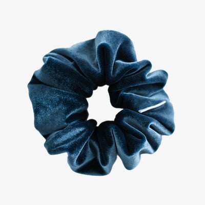 Blue scrunchie on a white background