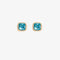 A set of three pairs of aquamarine earrings displayed on a light blue card. The set includes a pair of stud earrings, a pair of bar earrings with small aquamarine beads, and a pair of hoop earrings with dangling aquamarine stones. The card has the month 