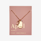 A gold necklace with a quartz stone pendant. The pendant also has the word 
