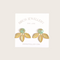 A pair of gold earrings with a leaf design. The earrings have a green, circular resin center with gold flecks. The leaves are attached to the center and can be detached.