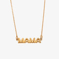 A gold necklace on a pink background. The necklace features a gold pendant with the word "MAMA" in bold letters. The text "COOL MAMA FOREVER" is printed on the background card, along with the brand name "Foxy Originals."