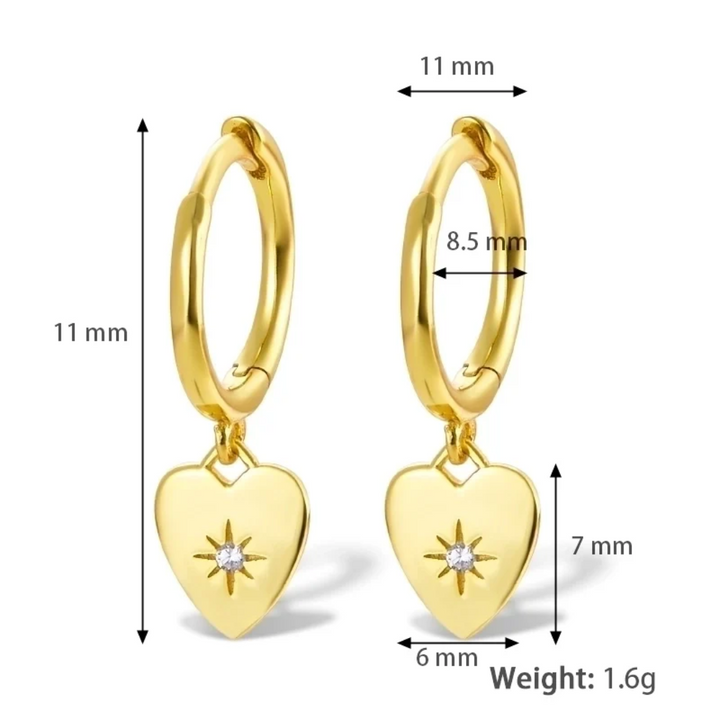 Gold plated heart drop earrings, featuring small gold hoops with dangling heart charms, each adorned with a central sparkling crystal. These romantic earrings are available in Ottawa, Ontario, Canada.