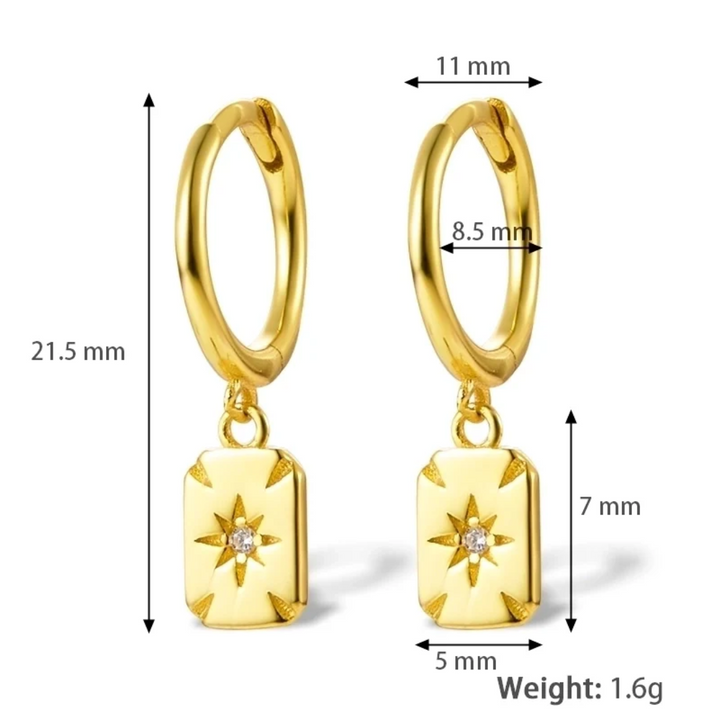 Gold plated rectangle drop earrings, potentially Bohomoon style, featuring small gold hoops with dangling rectangular charms, each with a central starburst design and a sparkling crystal. These modern earrings are available in Ottawa, Ontario, Canada.