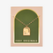 A gold necklace with a pendant shaped like an archway. The pendant has the words 