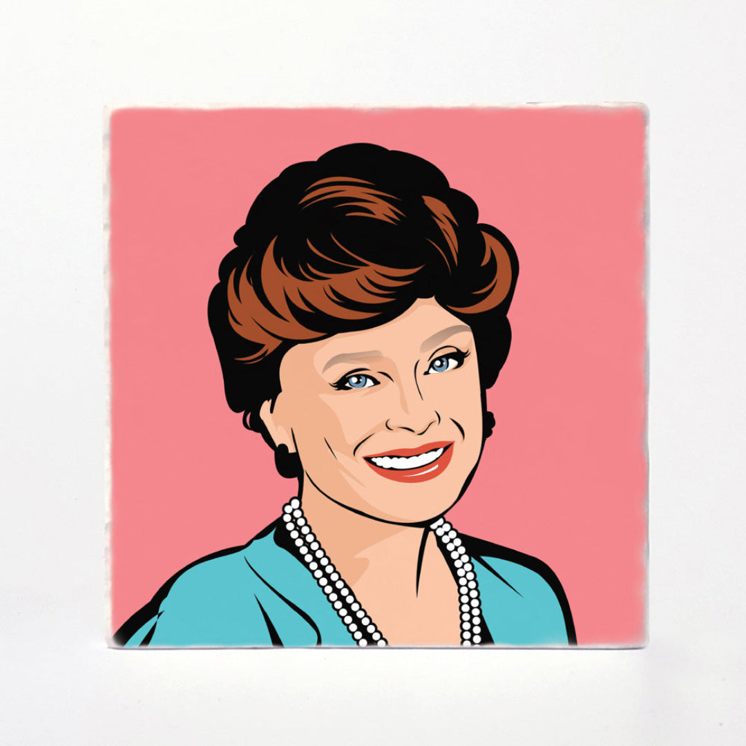 A square art print featuring a stylized pop-art portrait of a smiling woman with brown hair, blue eyes, and a turquoise top against a pink background, shown on a white surface.