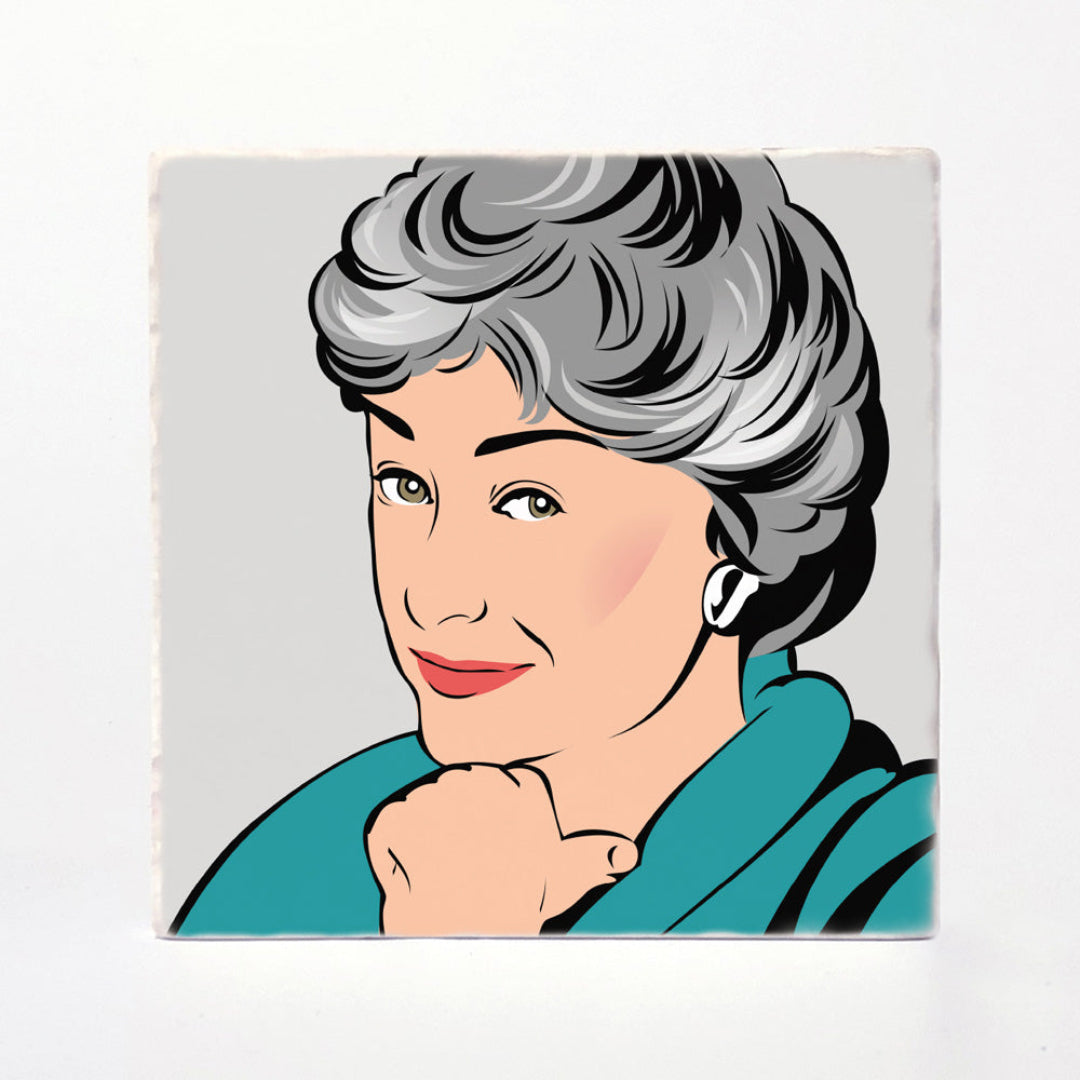 A square ceramic tile coaster featuring a stylized pop-art portrait of a woman with gray hair, wearing a teal top, set against a light gray background.