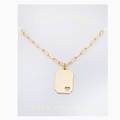 Gold necklace with a heart-shaped pendant on a 'Foxy Originals' card.