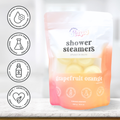 Packaging of grapefruit orange shower steamers with brand logo and product details on a white background.
